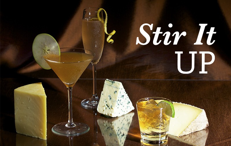 A scrumptious spread of cheeses and cocktails.