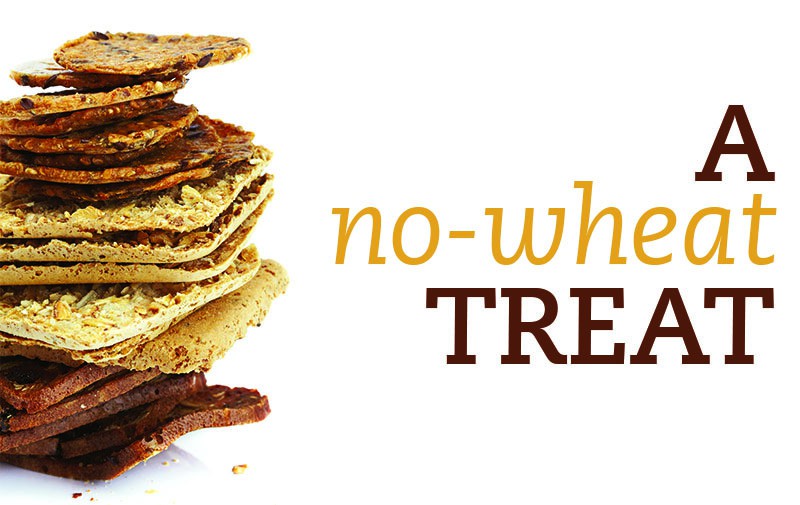 A stack of different kinds of gluten-free crackers.